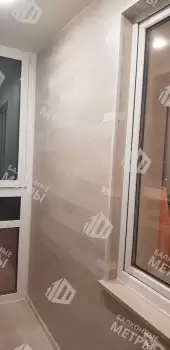 Панорамное остекление с тонировкой и отделка балкона